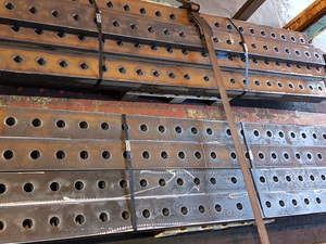Drilled rails made by Murray Steel Products